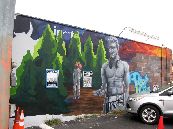 A second figure has been painted in the growing forest of green trees.