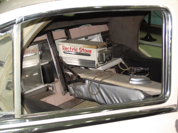 Not many cars feature an electric stove and ironing board!