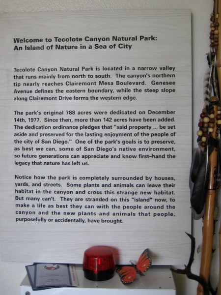 Sign inside the Tecolote Nature Center. The park was originally dedicated in 1977. Houses, yards and streets surround this area where the native environment still survives.
