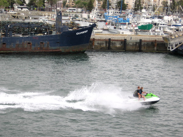 Someone enjoys recreating on San Diego Bay as we pass Tuna Harbor. Tourism and commercial fishing rely on San Diego's harbor.