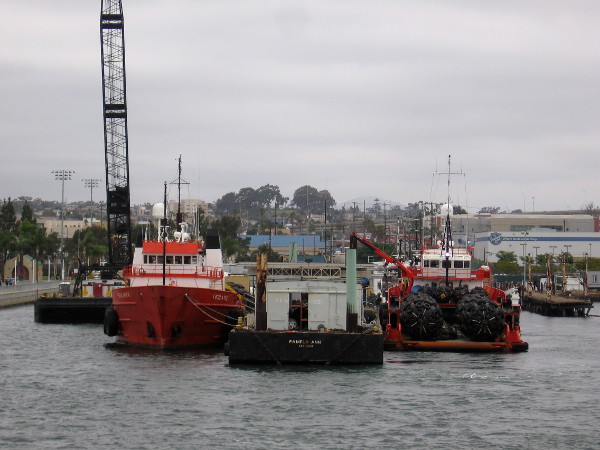 Docked south of the Tenth Avenue Marine Terminal, beside the Cesar Chavez Park pier, are the vessels of Pacific Tugboat Service.