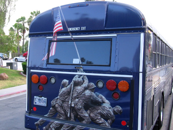 The United States Marine Corps bus contains an image of the flag being raised during the Battle of Iwo Jima.