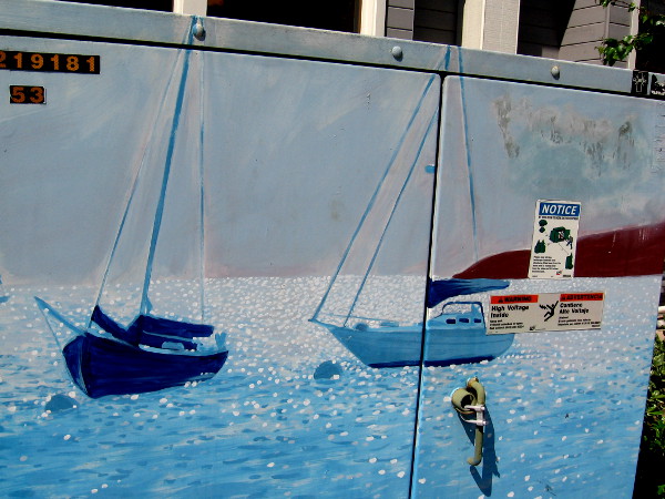 The water off Point Loma in this painted street art seems to glisten and sparkle.