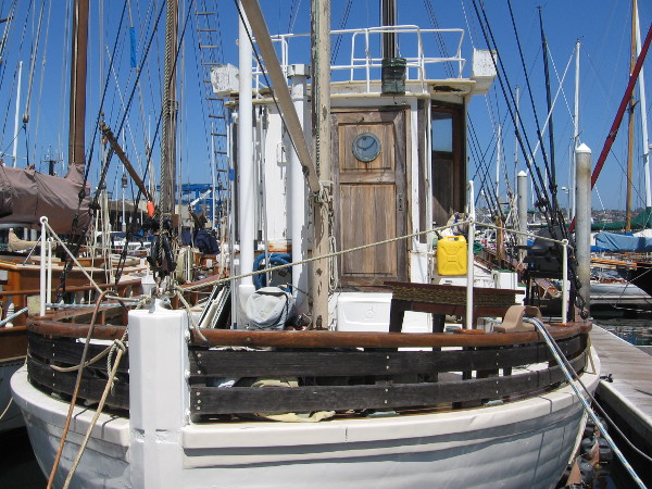 Wooden boats have amazing character. Even the weathering adds personality.