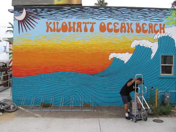 Meanwhile, another keg of beer is arriving in an alley by the Kilowatt Ocean Beach mural.