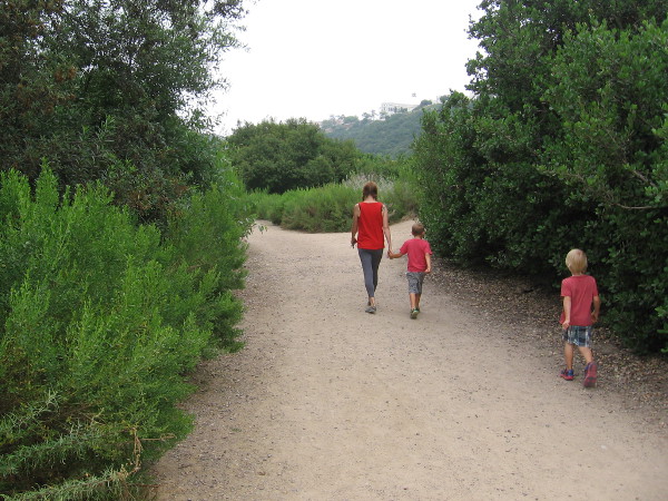 A family heads into Tecolote Canyon to explore nature.