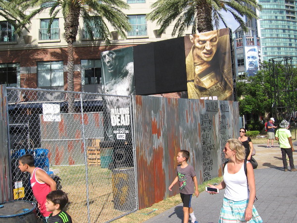 People peer into AMC's Deadquarters. It opens tomorrow.