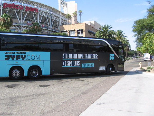 A Syfy bus wrap proclaims--Attention Time Travelers: No Spoilers.