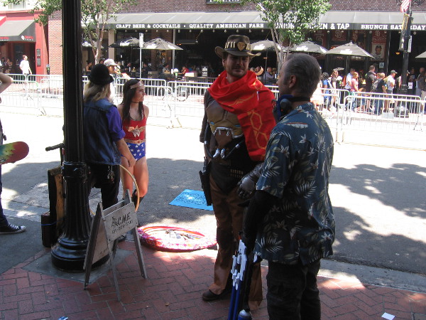 I saw lots of Wonder Woman cosplay. Not sure about the cowboyish guy.