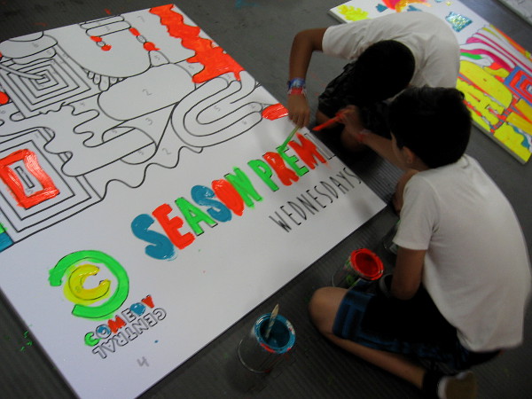 These kids are contributing, too. It's color by number.