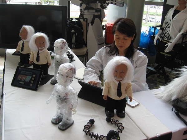 These interactive Professor Einstein robots challenge people with brain games.