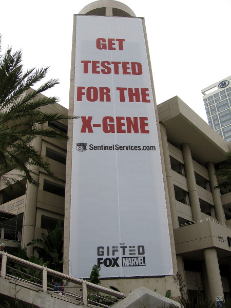Get tested for the X-Gene. Sentinel Services. A promotional banner on the Hilton during San Diego Comic-Con.