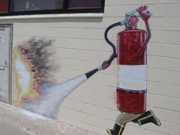 An animated red fire extinguisher chases and douses a flame on the wall of All County Fire.