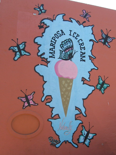 Butterflies are flitting about the wall of Mariposa Ice Cream.
