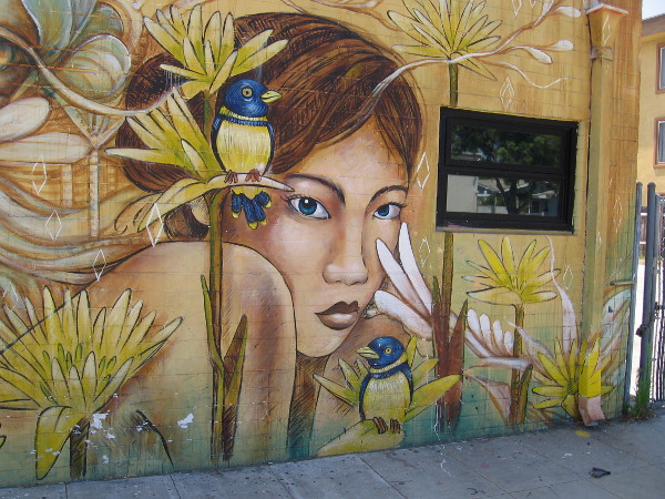 A beautiful face in a tropical setting.