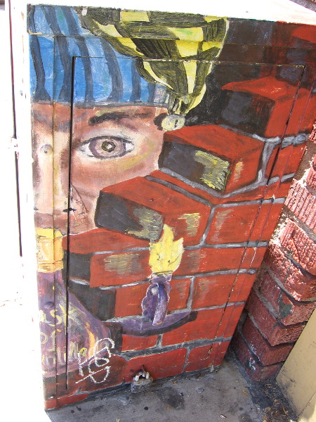 I love this box! Check out the face that seems to peer from behind bricks.