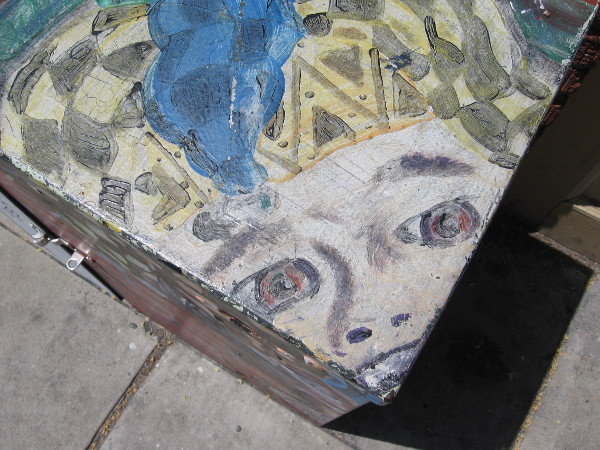 Eyes peer from one corner of the top.