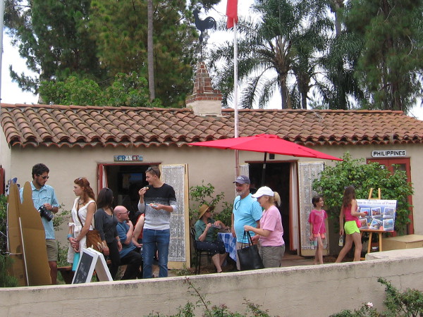 People gathered outside the House of France to listen to the music, talk, and look at some cultural displays.