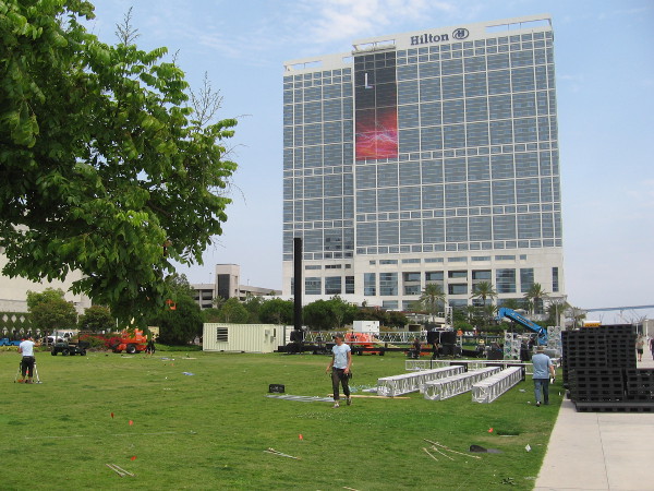 Lots of activity on the grass behind the San Diego Convention Center. It's the Saturday before 2017 Comic-Con! A wrap is being applied to the Bayfront Hilton!