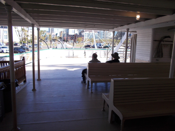 Some folks on the other end looking out at downtown San Diego and the Waterfront Park.