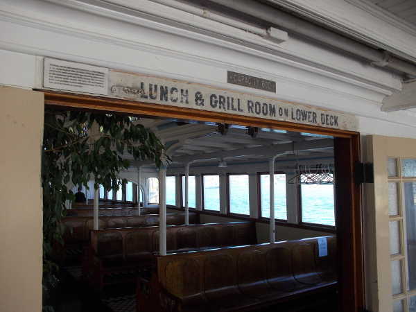 An old sign above one doorway says a Lunch and Grill Room are on the Lower Deck.