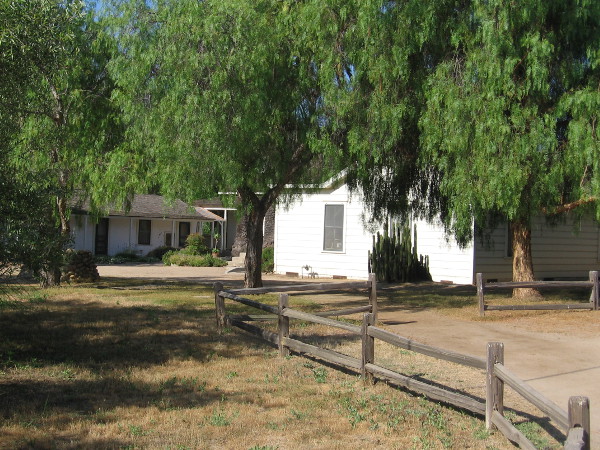 The ranch house is nestled among some shady trees. Two small adobe buildings were originally built in 1823. The house was enlarged by Captain George Alonzo Johnson in 1862.