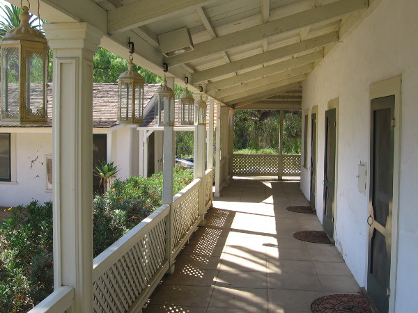 Part of the ranch house's long porch beside the courtyard.