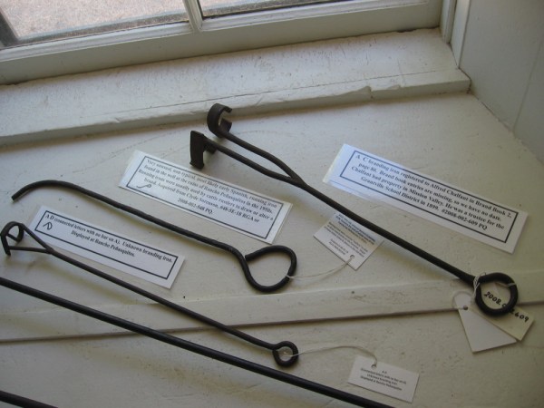 Various branding irons on display in the adobe house that were discovered around the ranch. Included are early Spanish irons used by rustlers.
