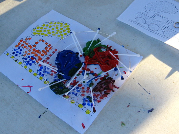 The San Diego Model Railroad Museum had a table in the plaza where kids could paint pictures of trains!