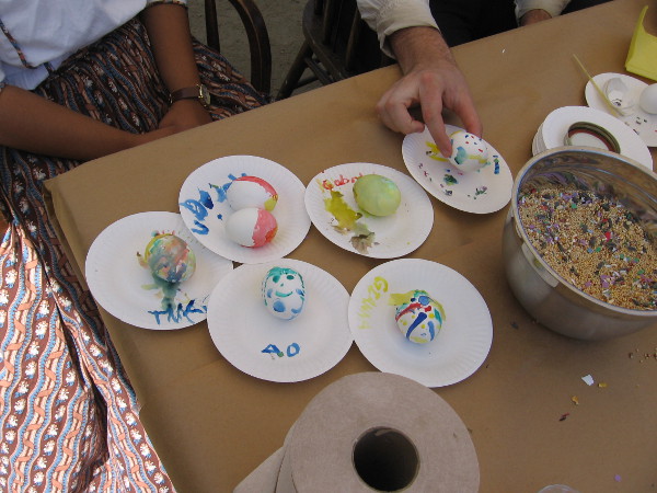 Preparing eggs for the cascarón. Near the end of a fiesta Californios flirted by cracking eggs filled with scented water or confetti over the startled head of someone they liked.