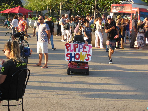 I spotted a Puppet Shows sign traveling through the plaza. So naturally I had to investigate...