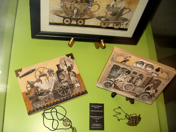 In a glass library display case I discovered steampunk collage art by Ramona Szczerba. She calls these curious vintage fictions.