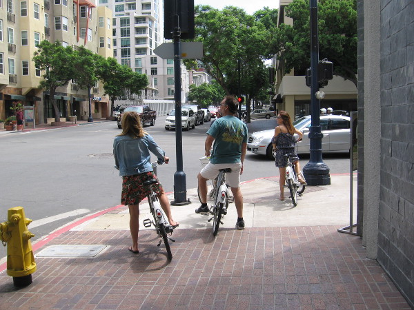 As I walked east up Ash I noticed some bicyclists looking around. Up ahead to the left is more construction.
