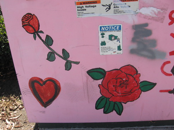 High voltage heart and two roses.