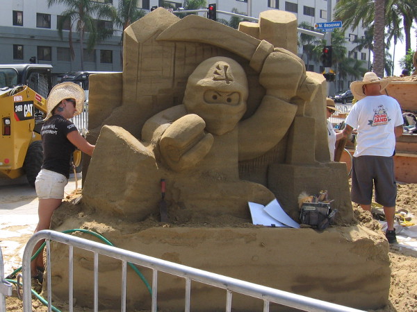 Melineige Beauregard, a champion sand sculptor from Quebec, is working on this super cool LEGO Ninjago piece!