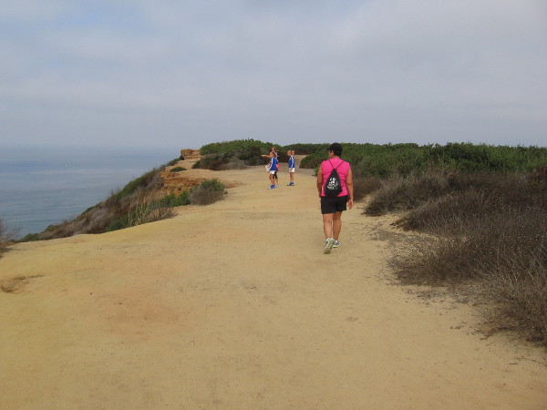 Walking along the cliffside trail north of the lighthouse.