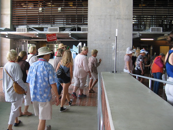 A mobile audience has arrived on foot from a nearby trolley station. They are led into downtown San Diego's dynamic public library to enjoy fantastic dance performances!