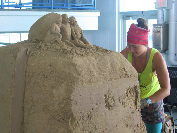 Morgan Rudluff from Santa Cruz, California is creating some great sand art representing campers gazing from a mountaintop into the distance.