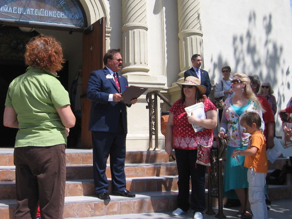 Fred Grand, President of the Old Town Chamber of Commerce, reads a proclamation during a special Constitution Day ceremony.