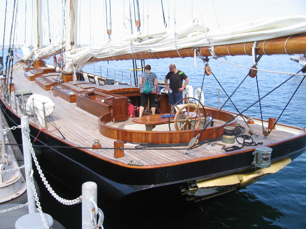 People at the Festival of Sail check out America, a somewhat enlarged replica of the victorious 1850 schooner for which America's Cup was named.