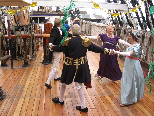 Performers on the Star of India demonstrate dancing that would have been common in 1805, when the Royal Navy beat France and Spain at the Battle of Trafalgar.