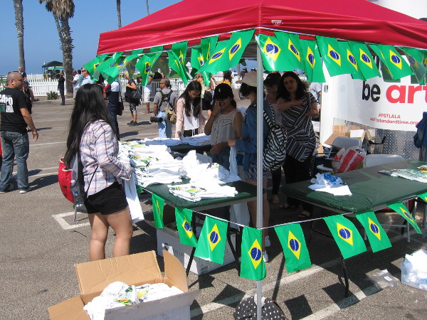 Lots of Brazilian flags at this t-shirt booth.