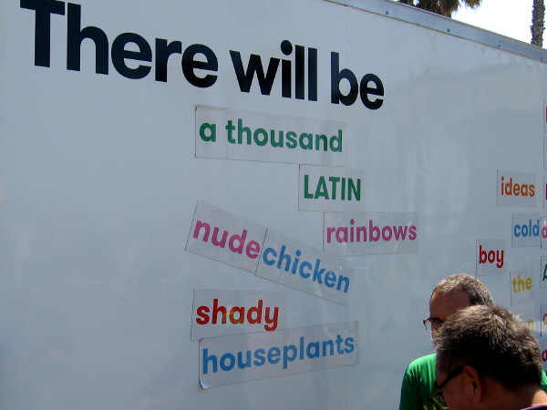 A group promoting Latin American and Latino art had this cool vehicle with word magnets. Visitors were creating poems. There will be a thousand LATIN rainbows.
