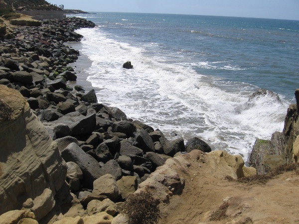 As we continue to walk south, we can see the coast vanishing into the distance. The actual Sunset Cliffs neighborhood is farther down the Point Loma peninsula.