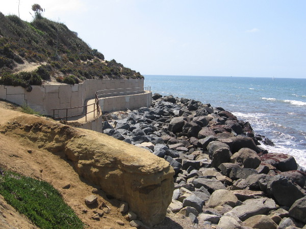 Now we're approaching an interesting part of the walk, with a short, undulating path along a sea wall.