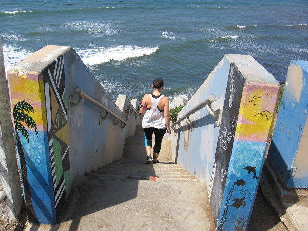 Someone gets exercise on the steps. At the top there is some fun artwork.
