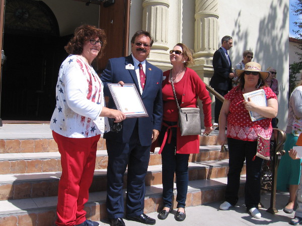 Kathleen Winchester, historian of the San Diego Chapter of the Daughters of the American Revolution, is presented with an official proclamation on Constitution Day.
