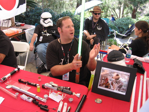 This member of the San Diego Sabers has personally made many lightsabers. Some examples lie on the group's table during Maker Faire in Balboa Park.
