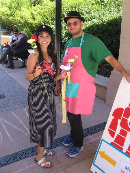Two smiles and free carnations from Give Love San Diego, at 2017 Maker Faire in Balboa Park!