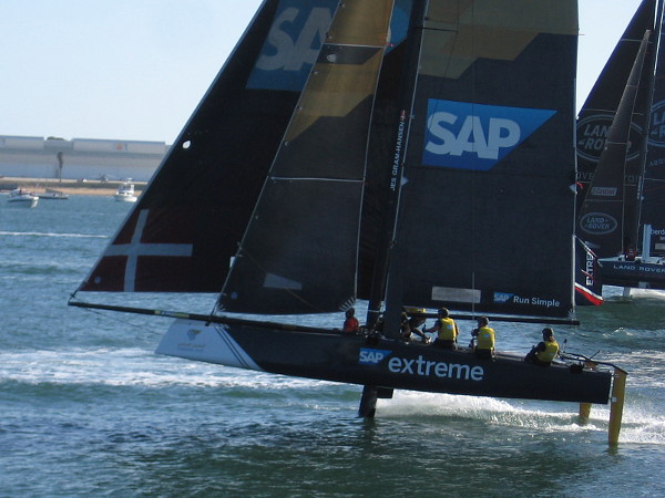 Once the catamarans attain sufficient speed, they become airborne, maintaining control with foils!